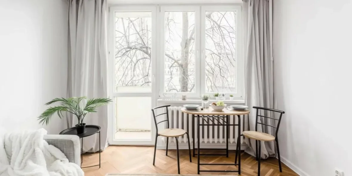 table and chairs in a flat in Poland