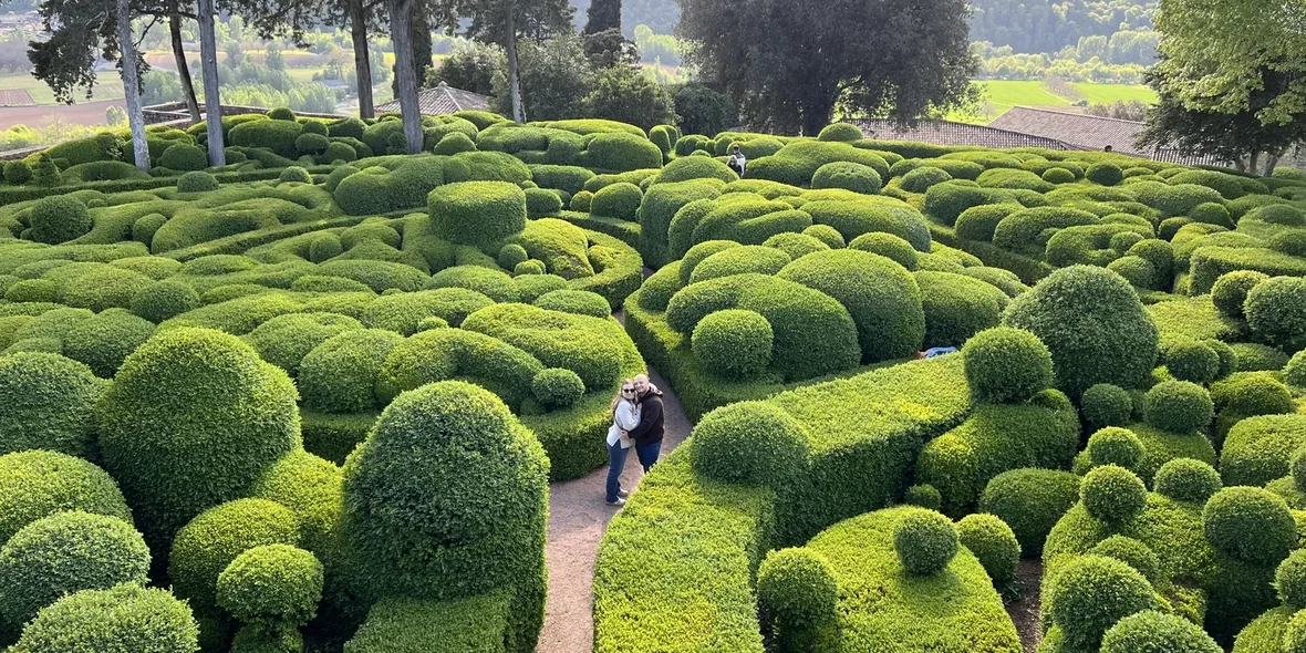 A couple in a French garden