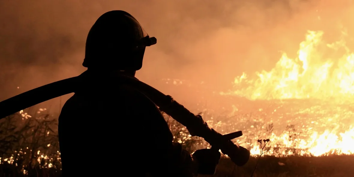 A fireman puts out a fire 