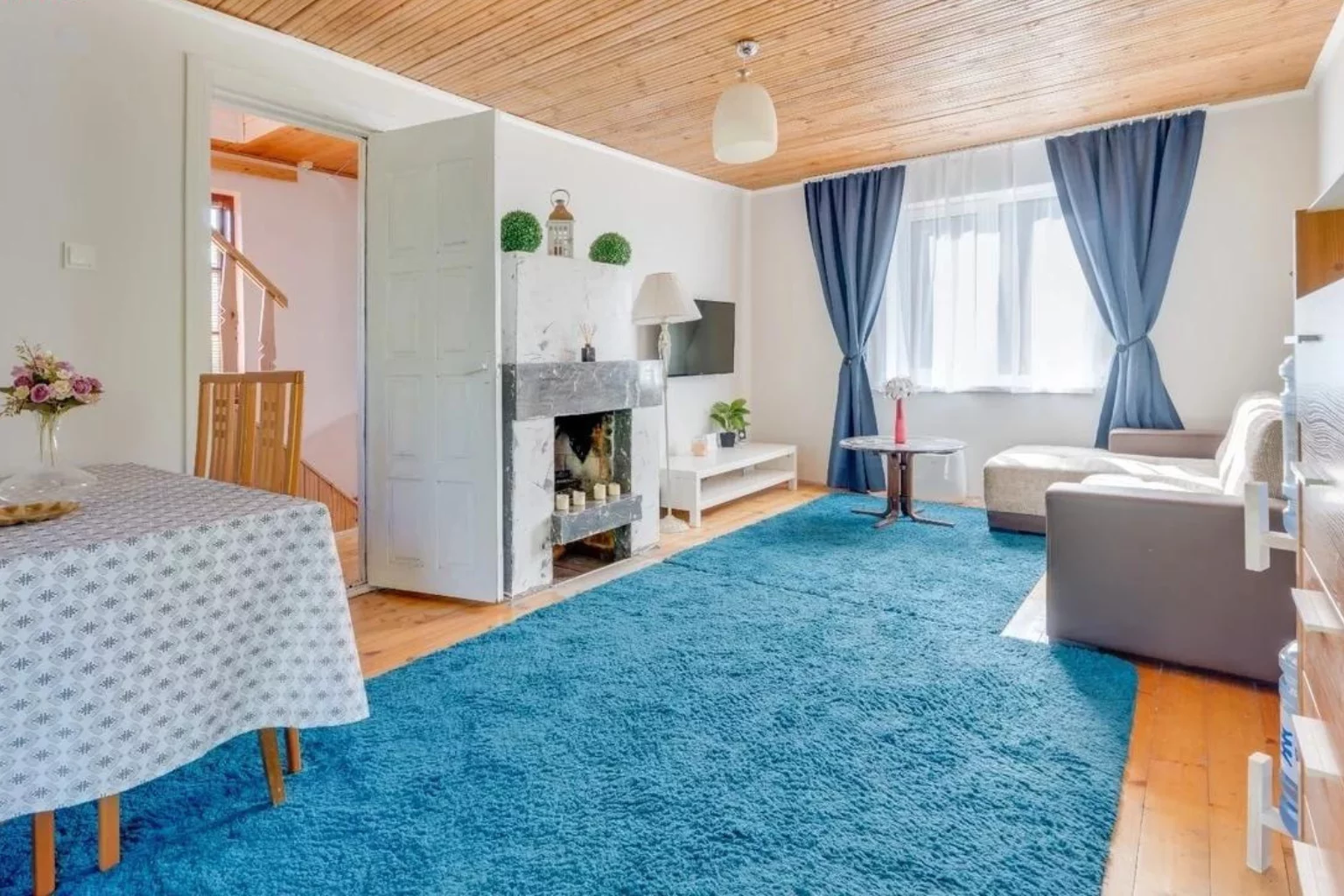 Large blue carpet in a house in Lithuania
