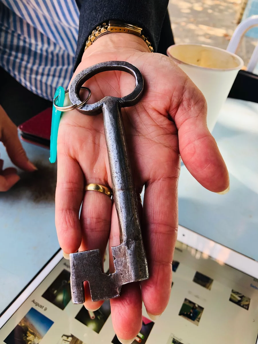 a big key to a house in Italy