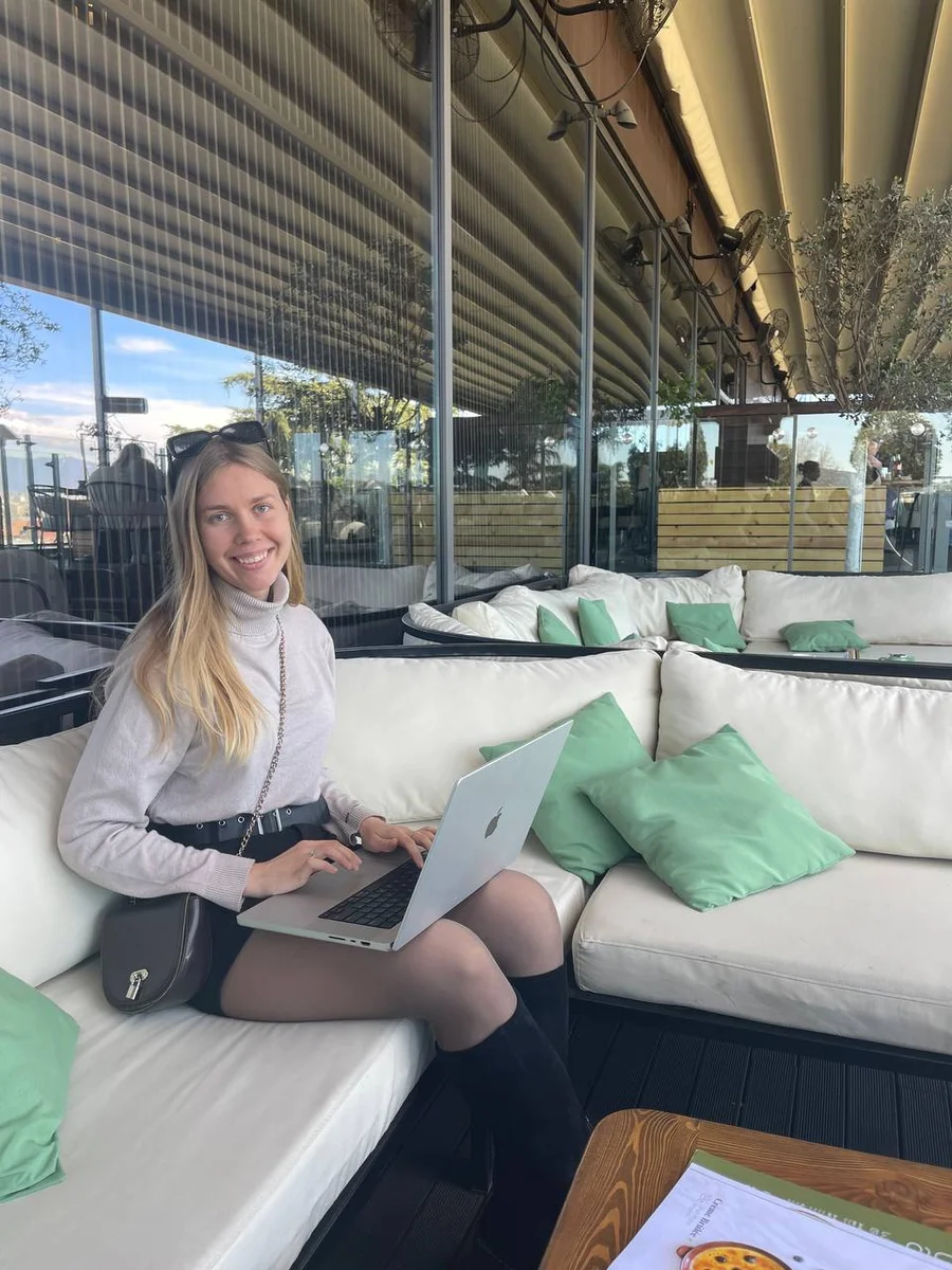 smiling girl in a cafe at work