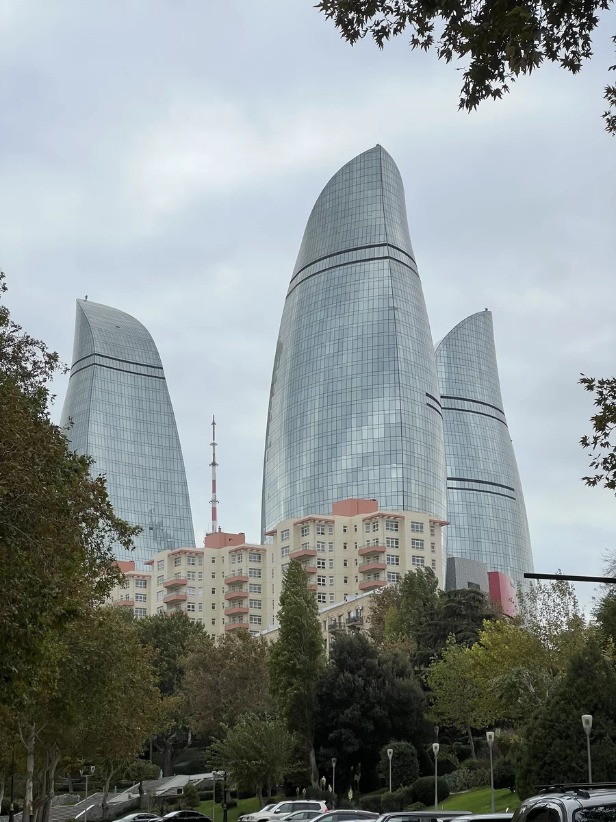 ordinary buildings, with skyscrapers in Baku in the back.