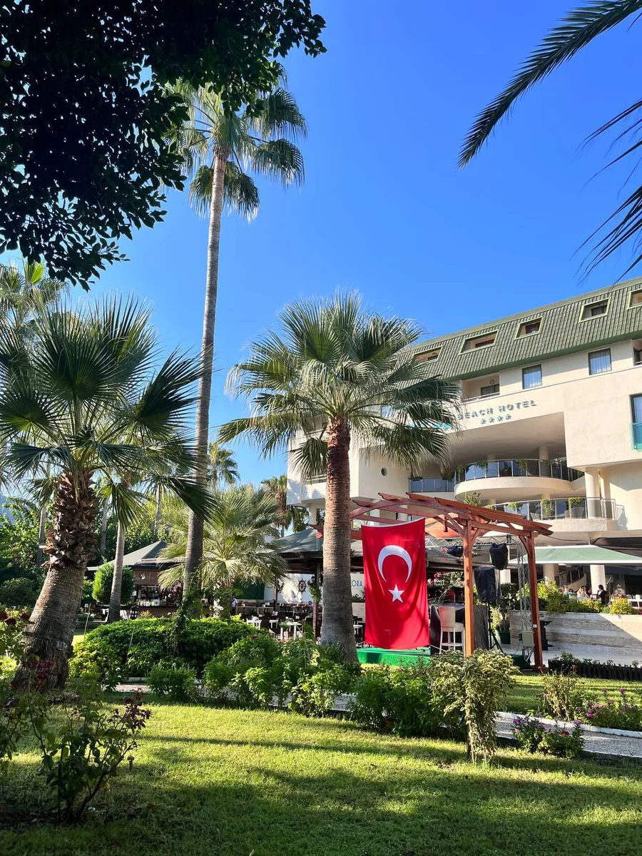 a building in Turkey among palm trees 