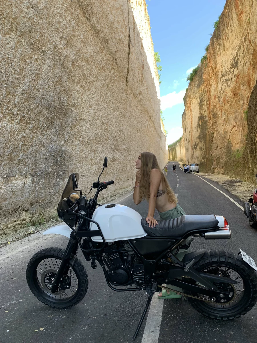 a photo on a motorcycle among the rocks