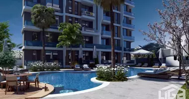 Apartamento 2 habitaciones con aparcamiento, con la piscina, con jardín en Koyunlar, Turquía