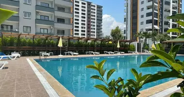 2 room apartment with parking, with swimming pool, with children playground in Erdemli, Turkey