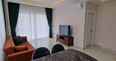 2 room apartment with parking, with swimming pool, with garden in Alanya, Turkey