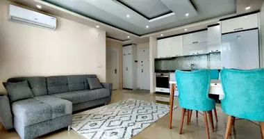 2 room apartment with parking, with swimming pool, with security in Alanya, Turkey