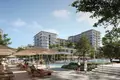 Wohnkomplex New residence Bayline & Avonlea with swimming pools and a park close to a highway and a marina, Port Rashid, Dubai, UAE