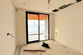 Wohnung in einem Neubau Wohnungen mit Meerblick in einer Wohnanlage am Strand in Çeşme