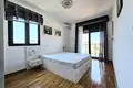 Rent a three-bedroom apartment in Becici + 2 parking spaces