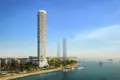  New high-rise residence Coral Reef with swimming pools and a spa center, Maritime City, Dubai, UAE