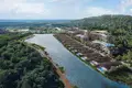 Complejo residencial New residential complex of villas with swimming pools right by the water in Laguna Phuket, Thailand