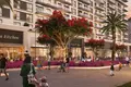  Modern apartment overlooking a large green park in a complex with shops and sports grounds, Town Square, Dubai, UAE