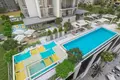 Complejo residencial Residential complex with terrace and swimming pool, on the shores of the Dubai Water Canal, in the popular area of Business Bay, Dubai, UAE
