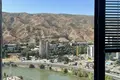 Breathtaking panorama view of Tbilisi, river, and mountains from each room.
