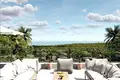 Kompleks mieszkalny New complex of villas with swimming pools and a view of the ocean close to the beach, Bali, Indonesia