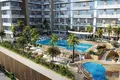 Complexe résidentiel New SOLA Residences with swimming pools and a kids' play area, Wasl Gate, Dubai, UAE