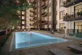 Residential complex New Kaya Residences with a swimming pool and a lounge area, Town Square, Dubai, UAE