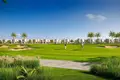 Kompleks mieszkalny New complex of luxury villas Fairway Villas with a golf course and restaurants, Emaar South, Dubai, UAE