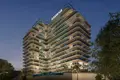 Residential complex New residence Samana Lake Views with swimming pools and lounge areas close to a highway, Production City, Dubai, UAE