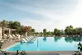 Residential complex New Golf Point Residence with a golf course, a park and a swimming pool, Emaar South, Dubai, UAE