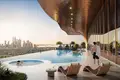 Residential complex New One Sky Park Residence with swimming pools in the quiet and green area of JVC, Dubai, UAE