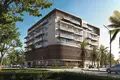 Wohnkomplex New S1LVA PARK Residence with swimming pools close to a school, in the green area of JVT, Dubai, UAE