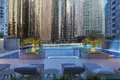 Wohnkomplex New high-rise residence Me Do Re 2 with swimming pools close to a golf club and a British school, in JLT, Dubai, UAE