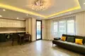 Квартира 1 комната 98 м² Махмутлар центр, Турция