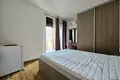 Rent a three-bedroom apartment in Becici + 2 parking spaces