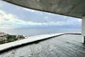 Wohnung in einem Neubau Wohnungen mit Meerblick in einer Wohnanlage am Strand in Çeşme