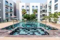 Kompleks mieszkalny Complex of serviced apartments Izzzi Life with a swimming pool and a co-working area, JVC, Dubai, UAE
