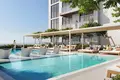 Wohnkomplex New S1LVA PARK Residence with swimming pools close to a school, in the green area of JVT, Dubai, UAE