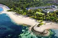 Kompleks mieszkalny New residential complex of villas and apartments on the ocean shore in Nusa Dui, Bali, Indonesia