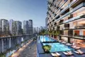  Futuristic residential complex with views of the waterfront, the Dubai Canal and the Burj Khalifa, Business Bay, Dubai, UAE