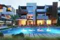 Kompleks mieszkalny Residence with swimming pools and gardens at 300 meters from the beach, Izmir, Turkey