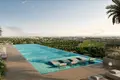 Kompleks mieszkalny New complex of furnished apartments Fairway Residences with swimming pools and views of the golf course, Dubai Sports City, Dubai, UAE