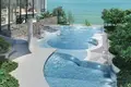 Wohnkomplex New waterfront high-rise residence with a private beach and a swimming pool, Pattaya, Thailand