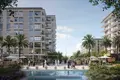 Wohnkomplex New residence Bayline & Avonlea with swimming pools and a park close to a highway and a marina, Port Rashid, Dubai, UAE