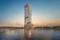 Residential complex New high-rise residence One River Point with swimming pools on the canal front, close to Burj Khalifa, Business Bay, Dubai, UAE