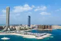 Residential complex Como Residences — tall residential complex by Nakheel with artificial lakes and sandy beach in Palm Jumeirah, Dubai
