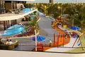 Wohnkomplex New residence Samana Portofino with swimming pools and a lounge area, Dubai Production City, Dubai, UAE