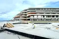 Wohnung in einem Neubau Wohnungen mit Meerblick in einer Wohnanlage am Strand in Çeşme