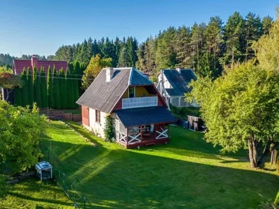 In Lithuania, near Vilnius, a cozy cottage by the lake is on sale for €82,000