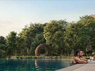 Complexe résidentiel New large complex Ghaf Woods (Capria) with swimming pools, restaurants and a forest area, Ghaf Woods, Dubai, UAE