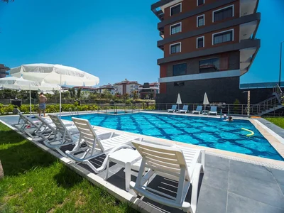 Complexe résidentiel Cozy residence with swimming pools at 150 meters from the beach, Kestel, Turkey