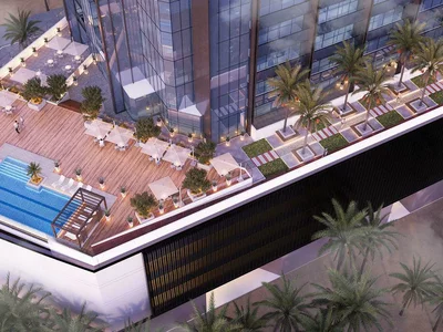 Complexe résidentiel High-rise residential complex with city views, close to the highway, Majan, Dubai, UAE