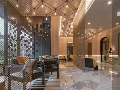 Residential complex High-rise residence with a swimming pool and lounge areas in a posh neighborhood of Bangkok, Thailand
